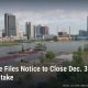 Downtown Toledo skyline along the Maumee River, with headline: The Blade Files Notice to Close Dec. 31; 116 Jobs at Stake
